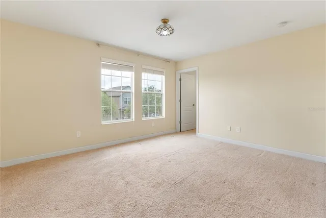 an empty room with windows