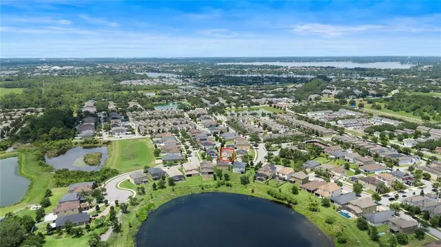 an aerial view of a city with lots of residential buildings