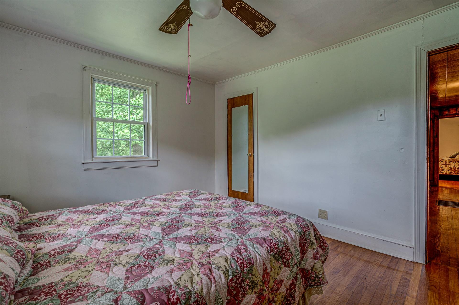 2815 Dryhill Road Ferrum, VA 24088 - Photo 22 of 41 a bedroom with a bed and a window
