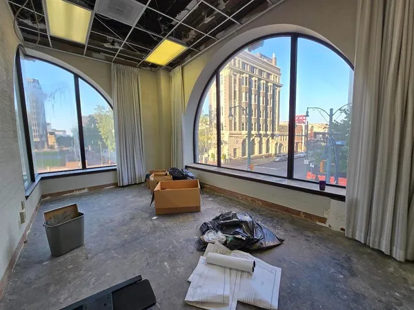 a room with furniture and a window