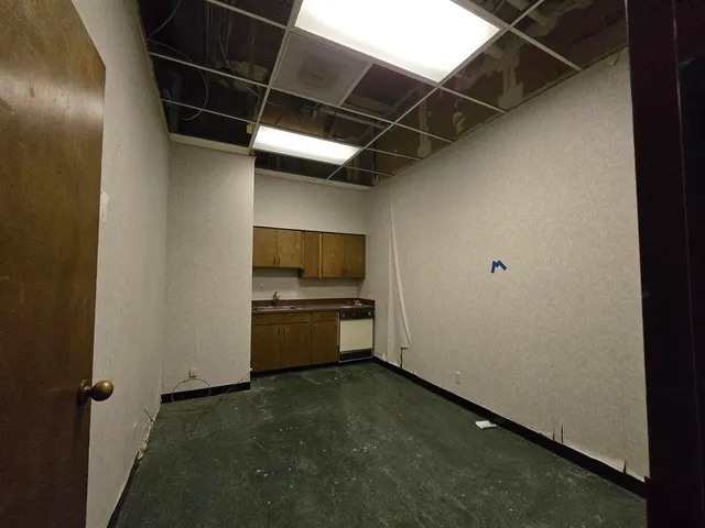 a room with furniture and a window