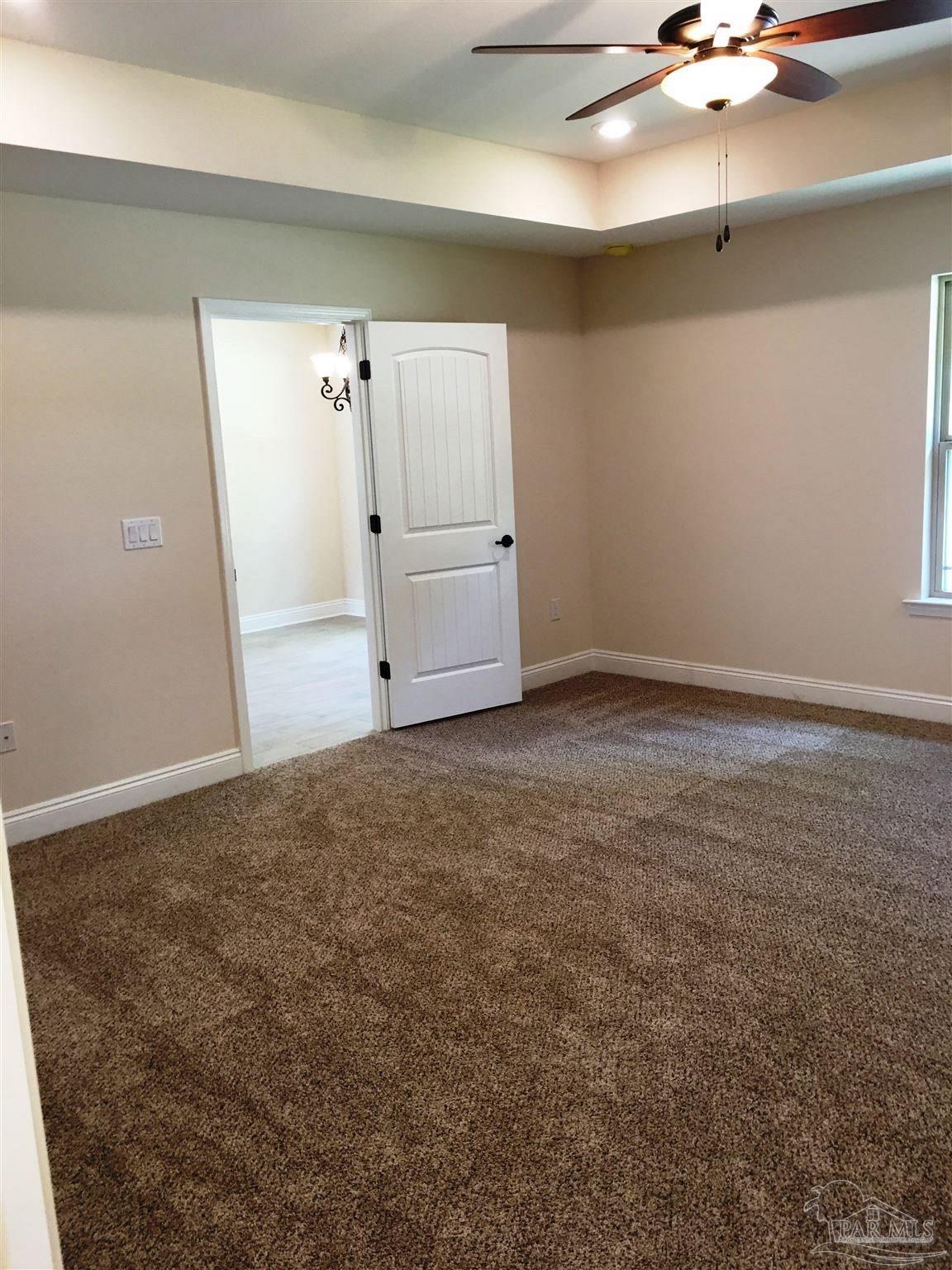 5308 South A Jones Road Milton, FL 32583 - Photo 17 of 27 A view within master toward its entry/exit.