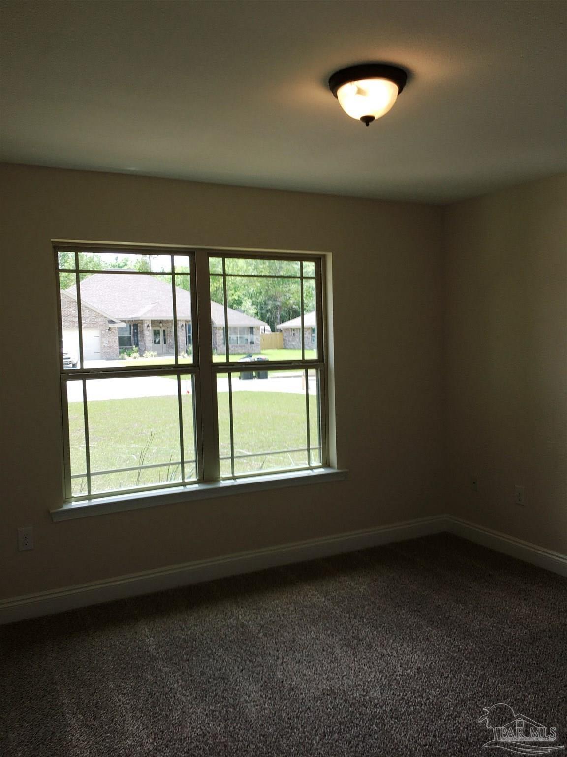 5308 South A Jones Road Milton, FL 32583 - Photo 18 of 27 A view of the 2nd bedroom is shown here.