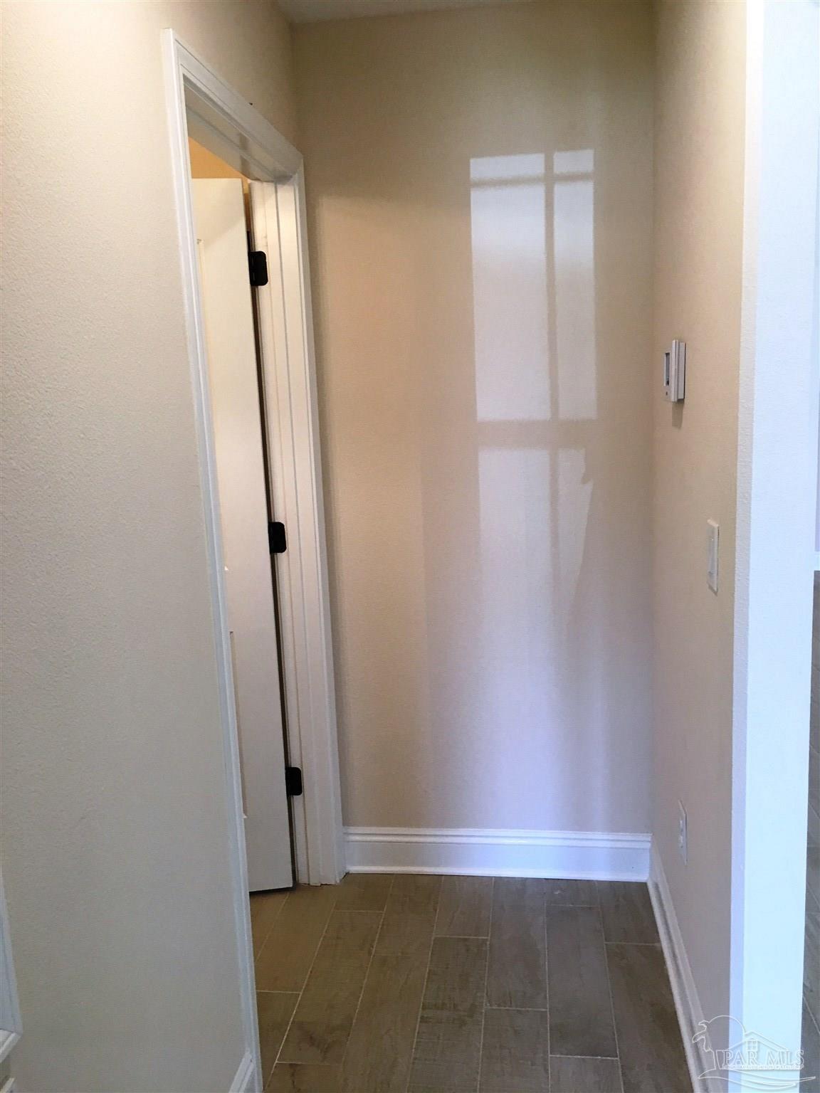 5308 South A Jones Road Milton, FL 32583 - Photo 19 of 27 Front hall leads to 1 bedroom & 1 bath.