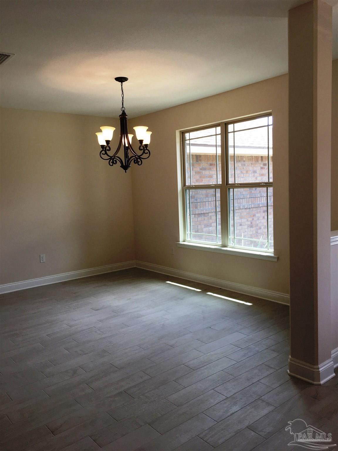 5308 South A Jones Road Milton, FL 32583 - Photo 3 of 27 Dining room is a great setting for special events.