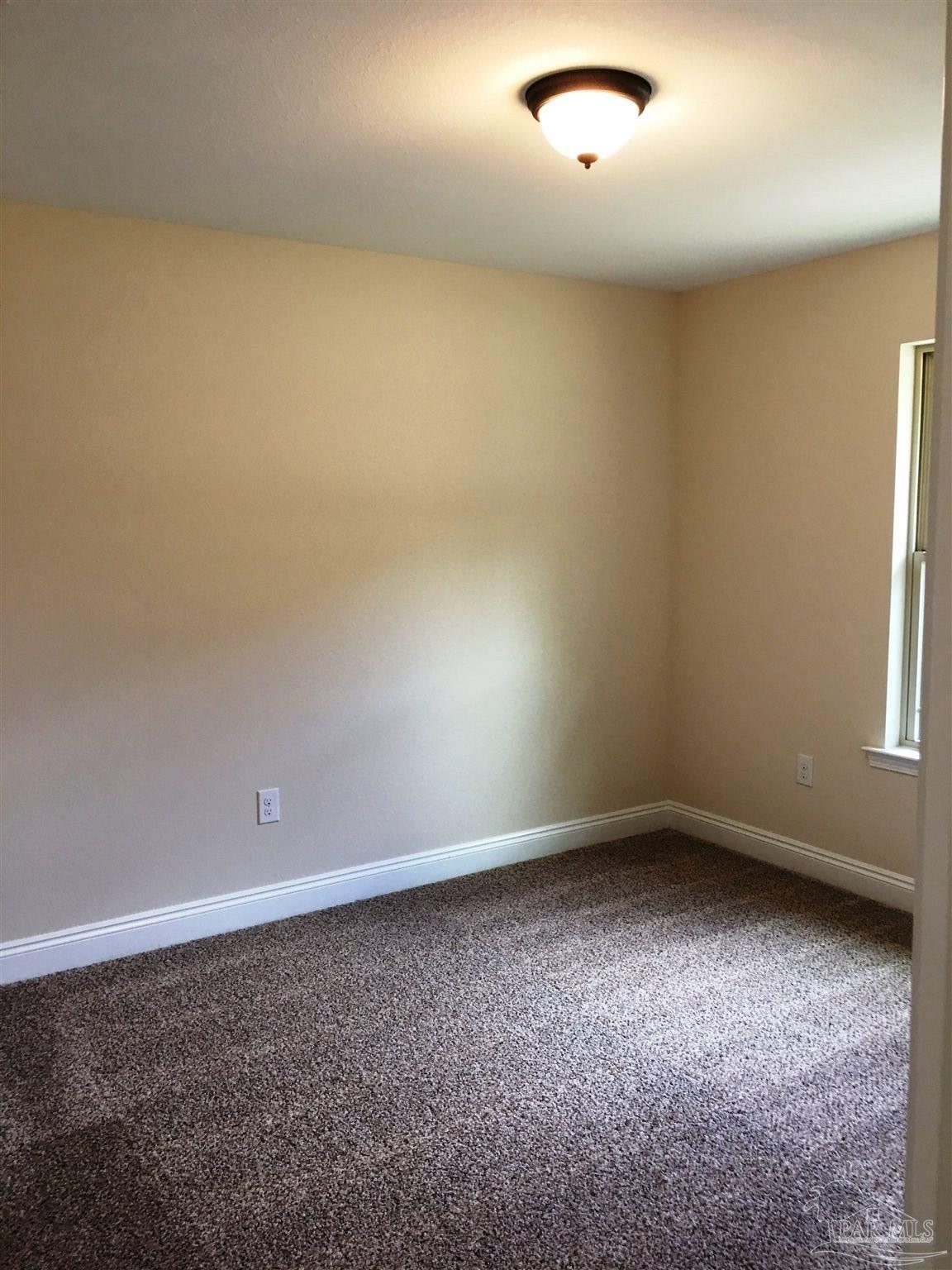 5308 South A Jones Road Milton, FL 32583 - Photo 21 of 27 Here's a view of the 3rd bedroom.
