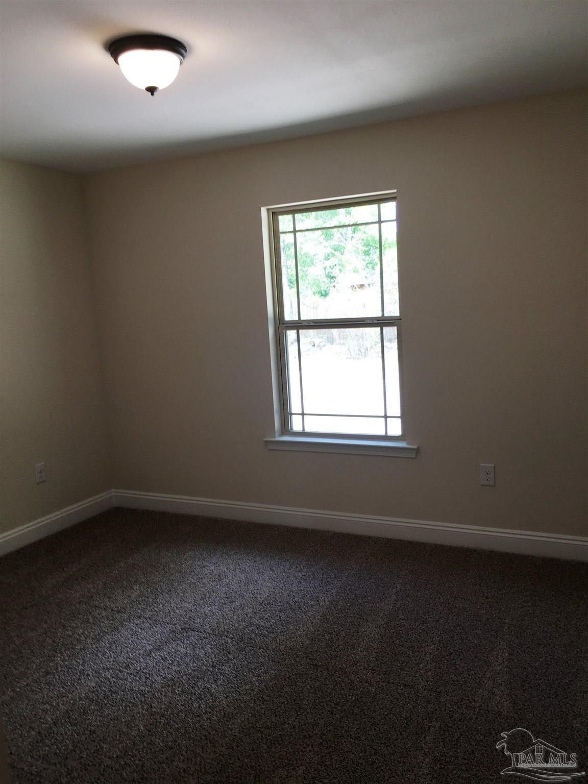 5308 South A Jones Road Milton, FL 32583 - Photo 24 of 27 A view of the 4th bedroom is shown here.