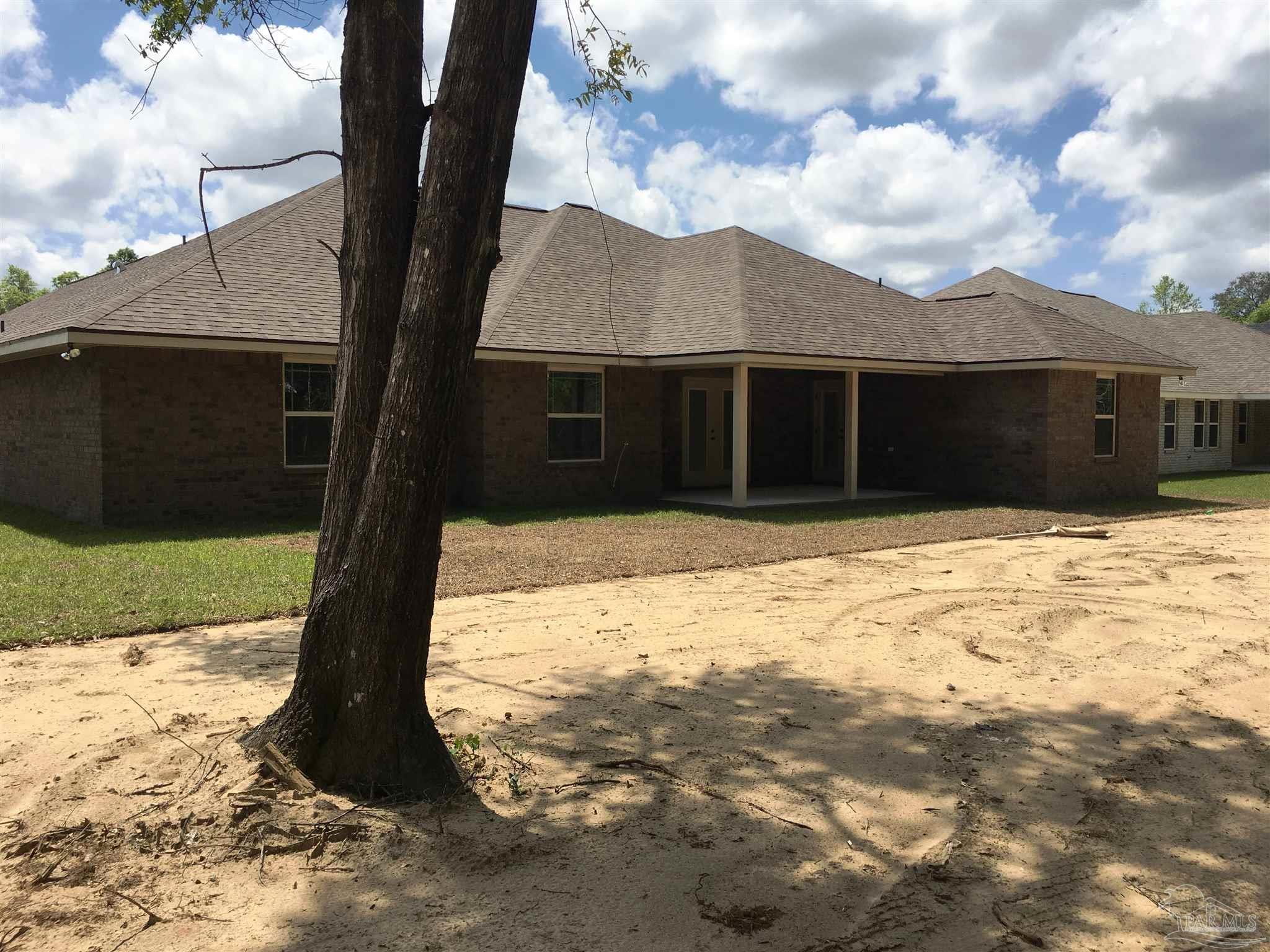 5308 South A Jones Road Milton, FL 32583 - Photo 27 of 27 A view of the rear elevation is shown here.