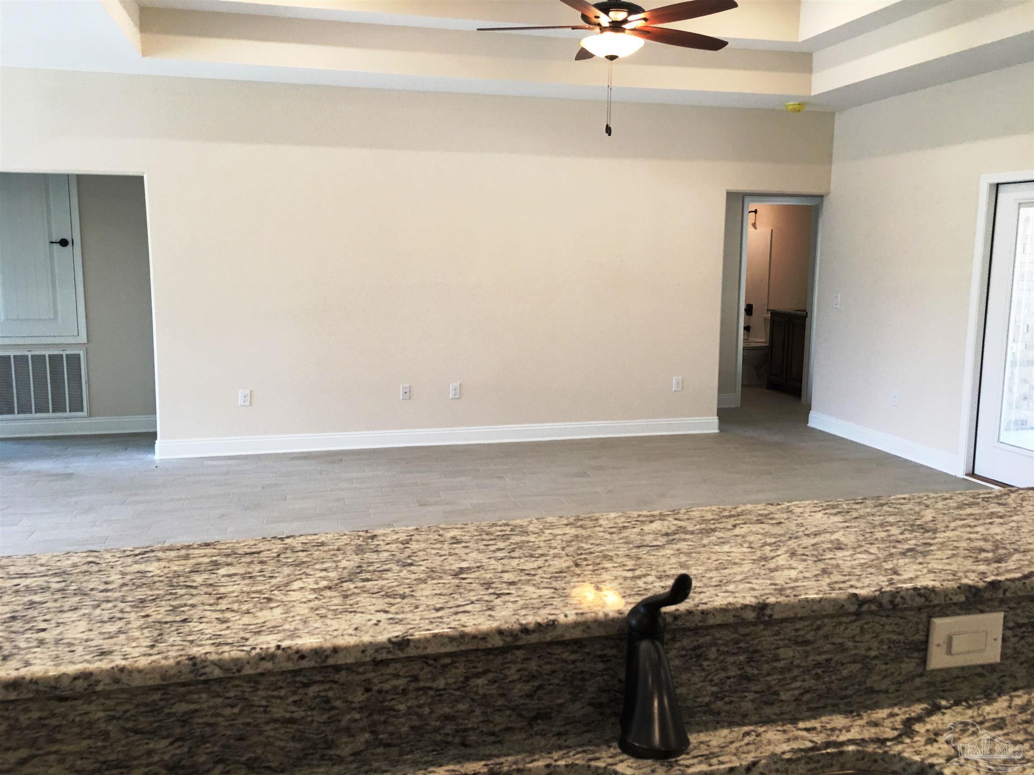 5308 South A Jones Road Milton, FL 32583 - Photo 7 of 27 Bar provides additional seating area for meals.