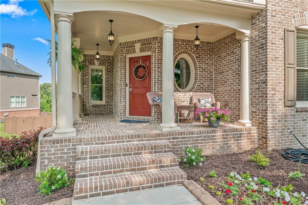 a front view of a house with outdoor space