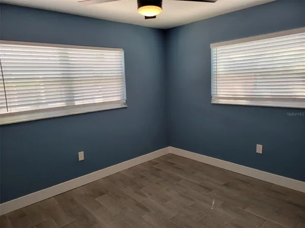 a view of a window in an empty room