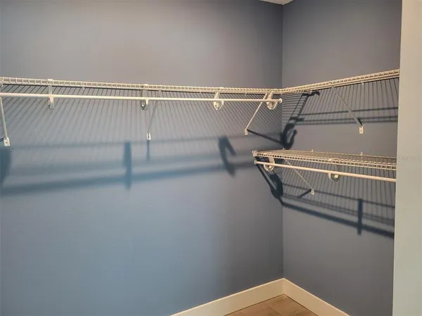 a view of a room with racks on the wall