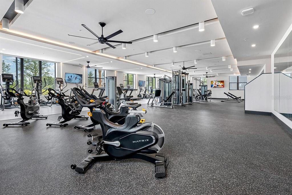 425 Centerpointe Circle, Unit S1 Altamonte Springs, FL 32701 - Photo 18 of 24 a view of a room with gym equipment