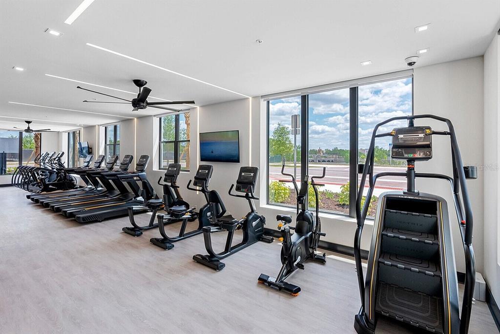 425 Centerpointe Circle, Unit S1 Altamonte Springs, FL 32701 - Photo 19 of 24 a view of a room with gym equipment