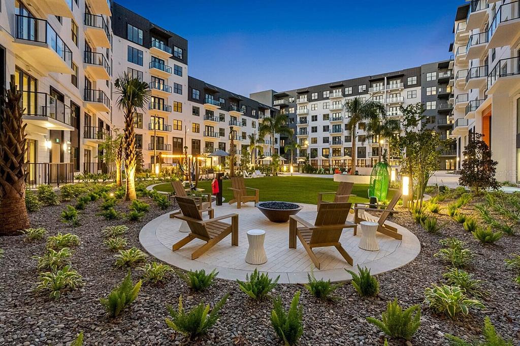 425 Centerpointe Circle, Unit S1 Altamonte Springs, FL 32701 - Photo 3 of 24 a view of a patio with couches and table and chairs