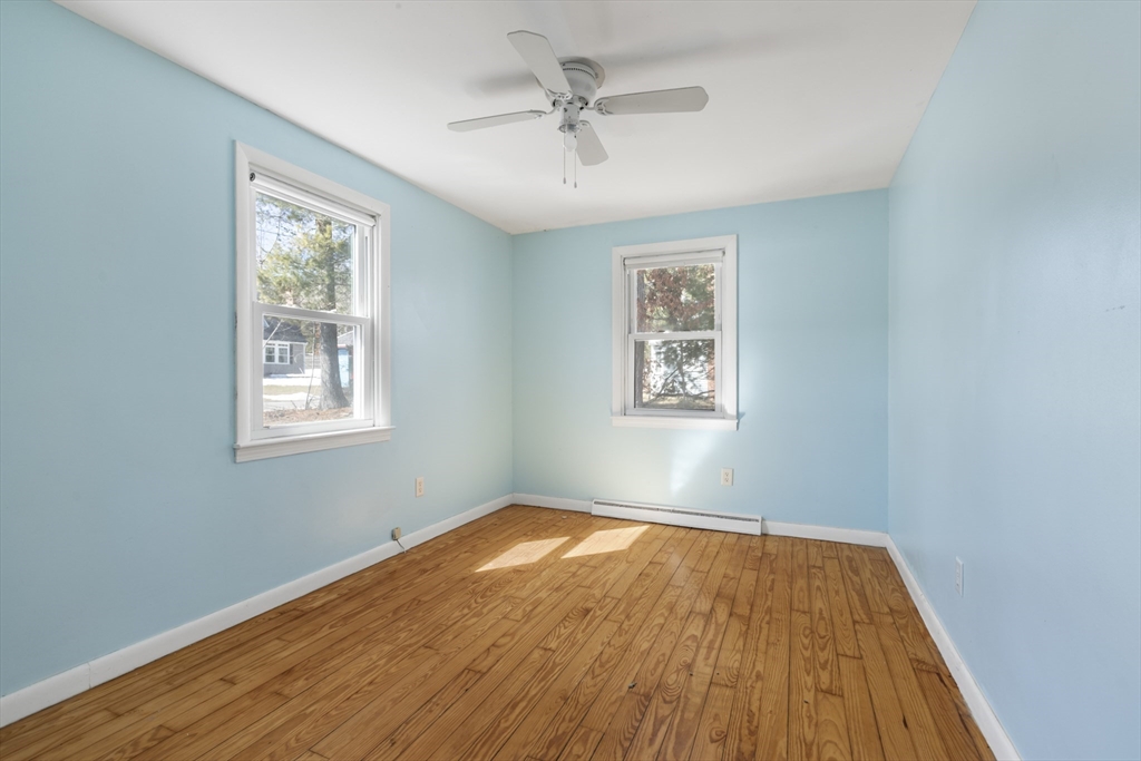 21 River Road Marion, MA 02738 - Photo 15 of 29 a view of empty room with wooden floor and fan