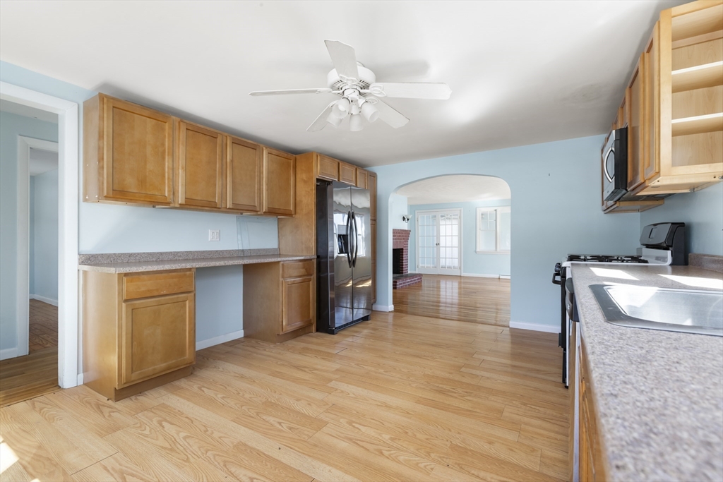 21 River Road Marion, MA 02738 - Photo 3 of 29 a view of a kitchen with a sink and cabinet