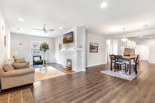 a living room with furniture and a table