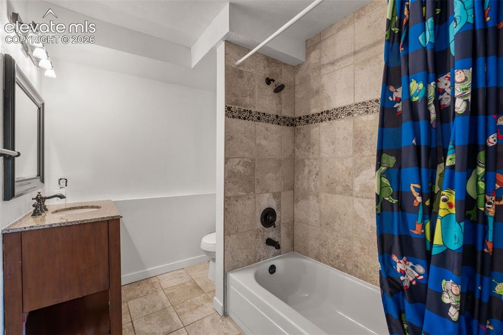 125 Diamond E Road Fountain, CO 80817 - Photo 26 of 43 a bathroom with a bathtub and a shower
