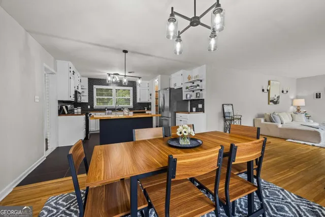 a view of a dining room with furniture