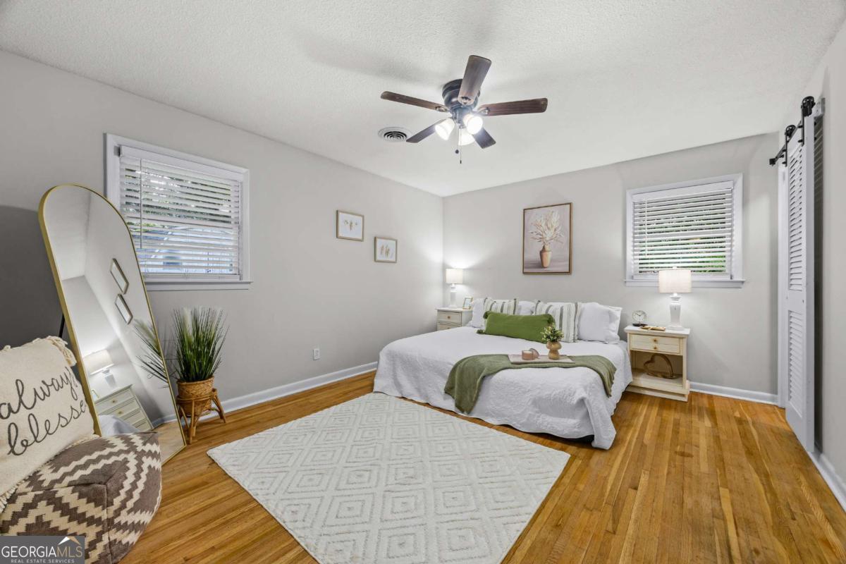 110 Valley Road Toccoa, GA 30577 - Photo 24 of 39 a bed room with bed and windows