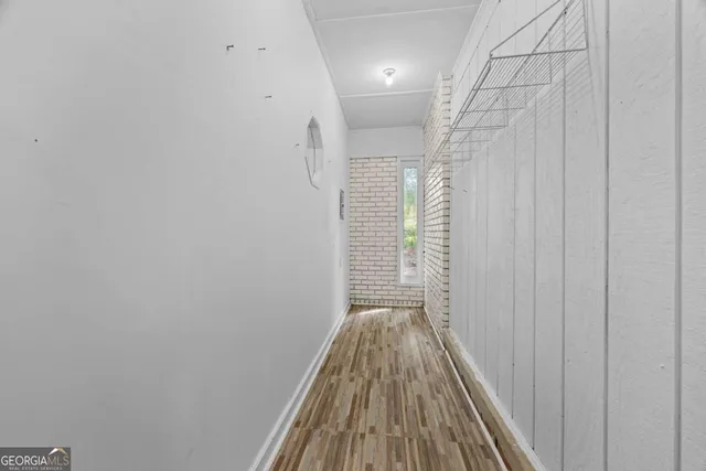 a view of wooden floor in a bathroom