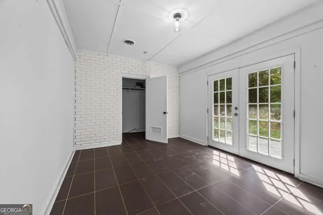 an empty room with windows