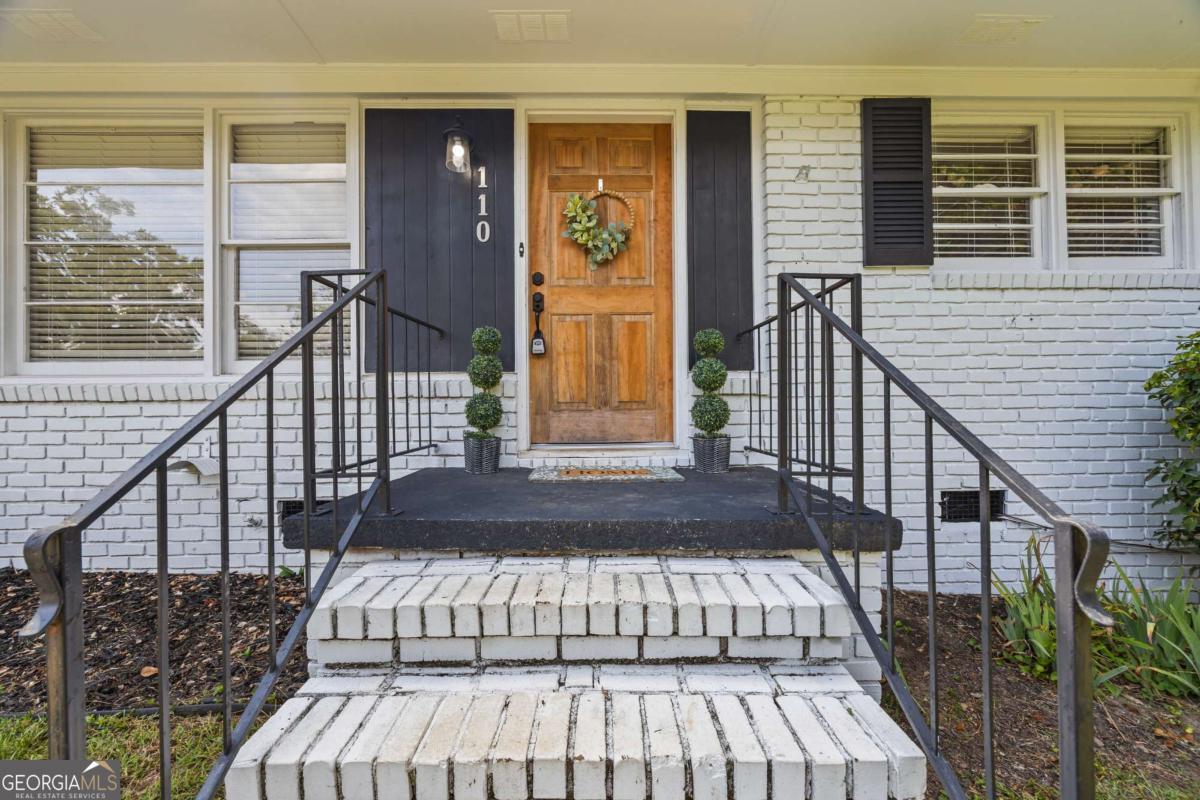 110 Valley Road Toccoa, GA 30577 - Photo 4 of 39 a view of entryway with wooden floor and stairs