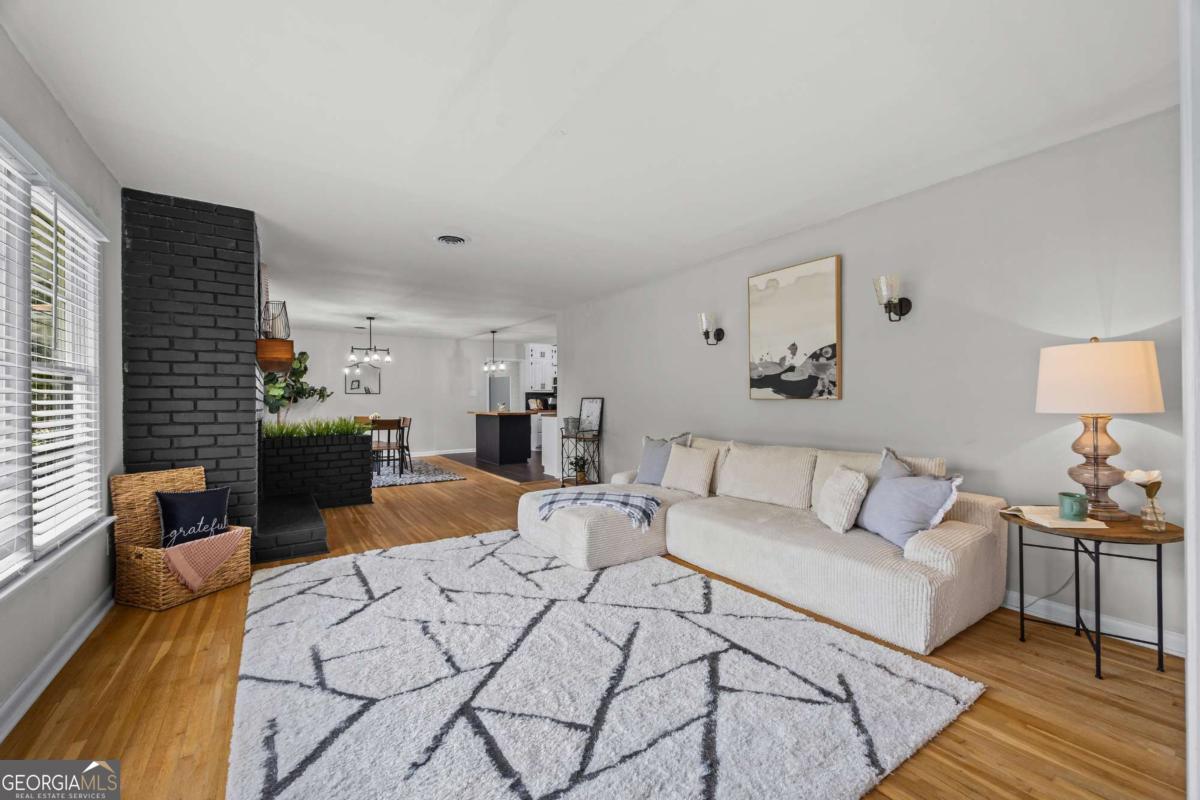 110 Valley Road Toccoa, GA 30577 - Photo 10 of 39 a living room with furniture and wooden floor
