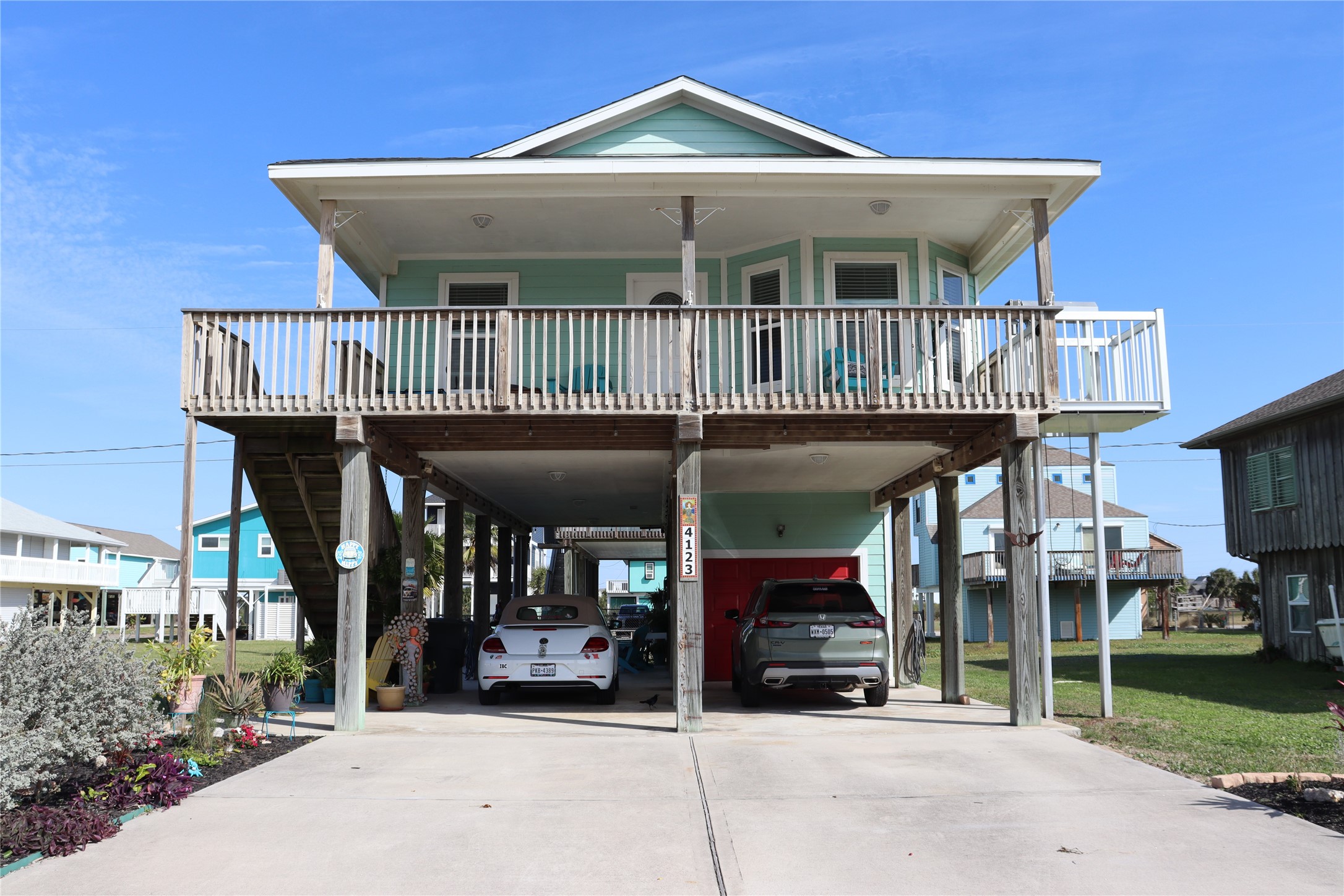 4123 Reeves Drive Galveston, TX 77554 - Photo 1 of 28 a view of a house with porch and furniture