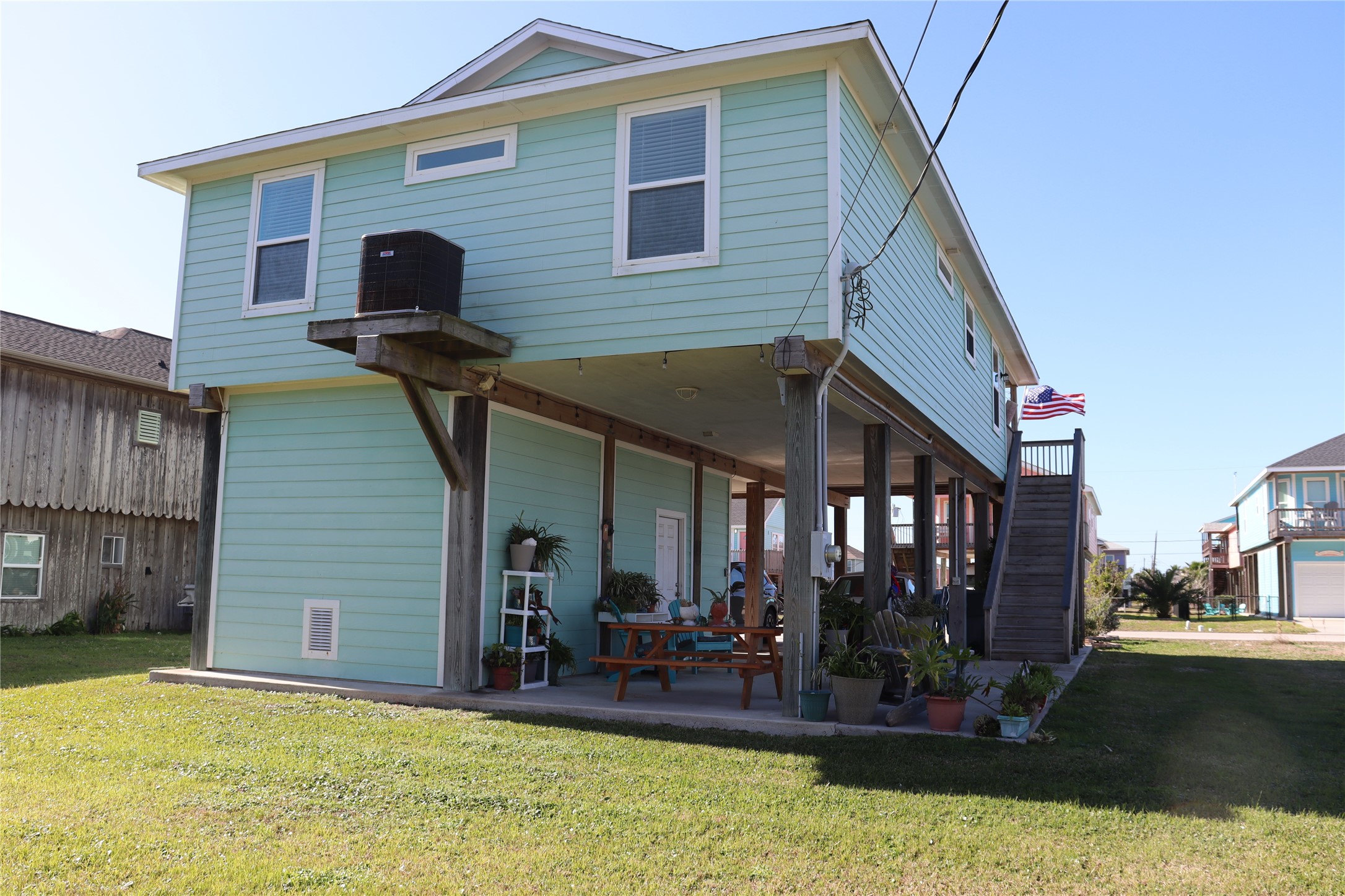 4123 Reeves Drive Galveston, TX 77554 - Photo 15 of 28 a view of a house with yard and porch