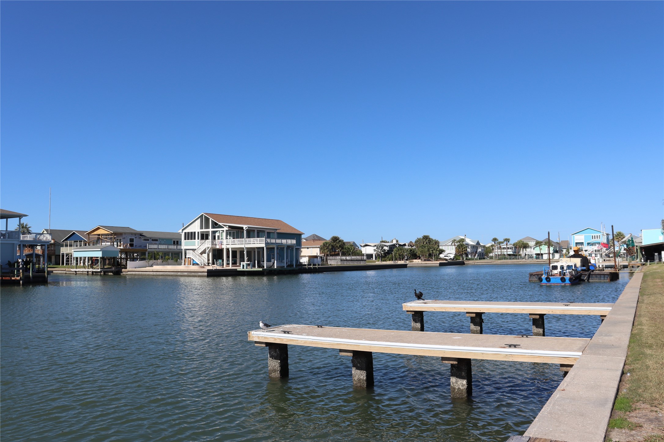 4123 Reeves Drive Galveston, TX 77554 - Photo 22 of 28 a view of a lake with city