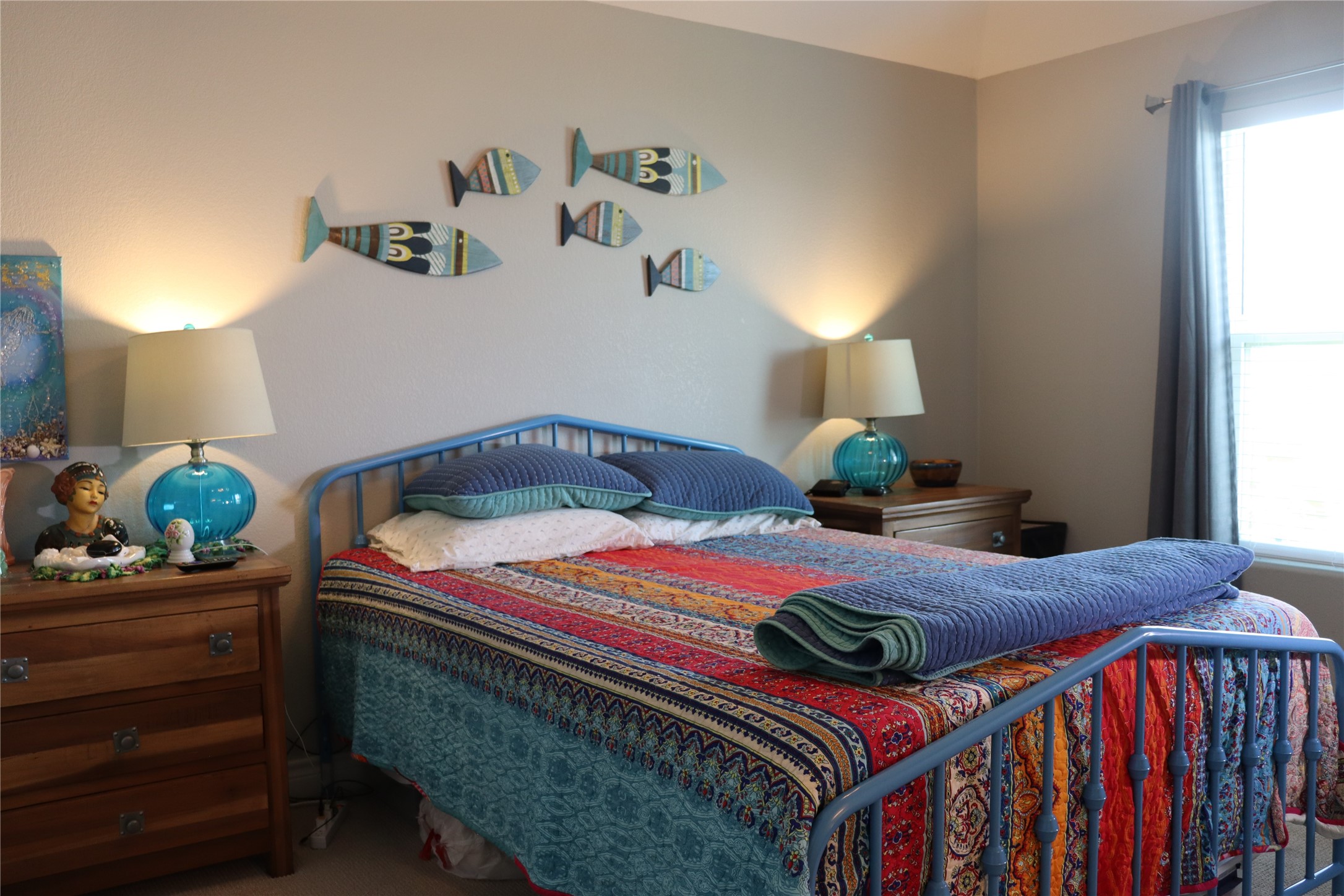 4123 Reeves Drive Galveston, TX 77554 - Photo 4 of 28 a bedroom with a bed and a dresser in it