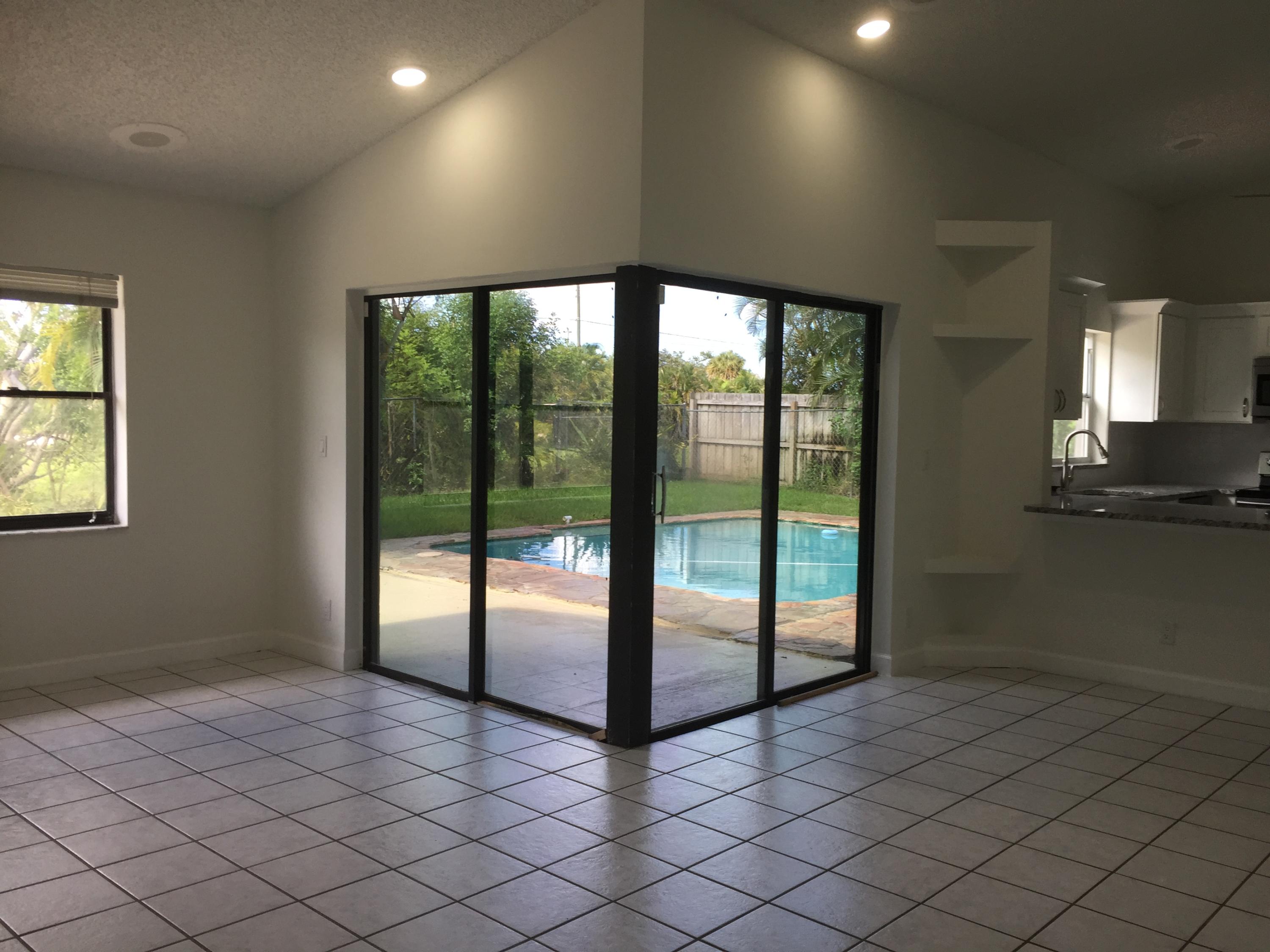 9235 Edgemont Lane Boca Raton, FL 33434 - Photo 3 of 22 Living Room and Dining Room