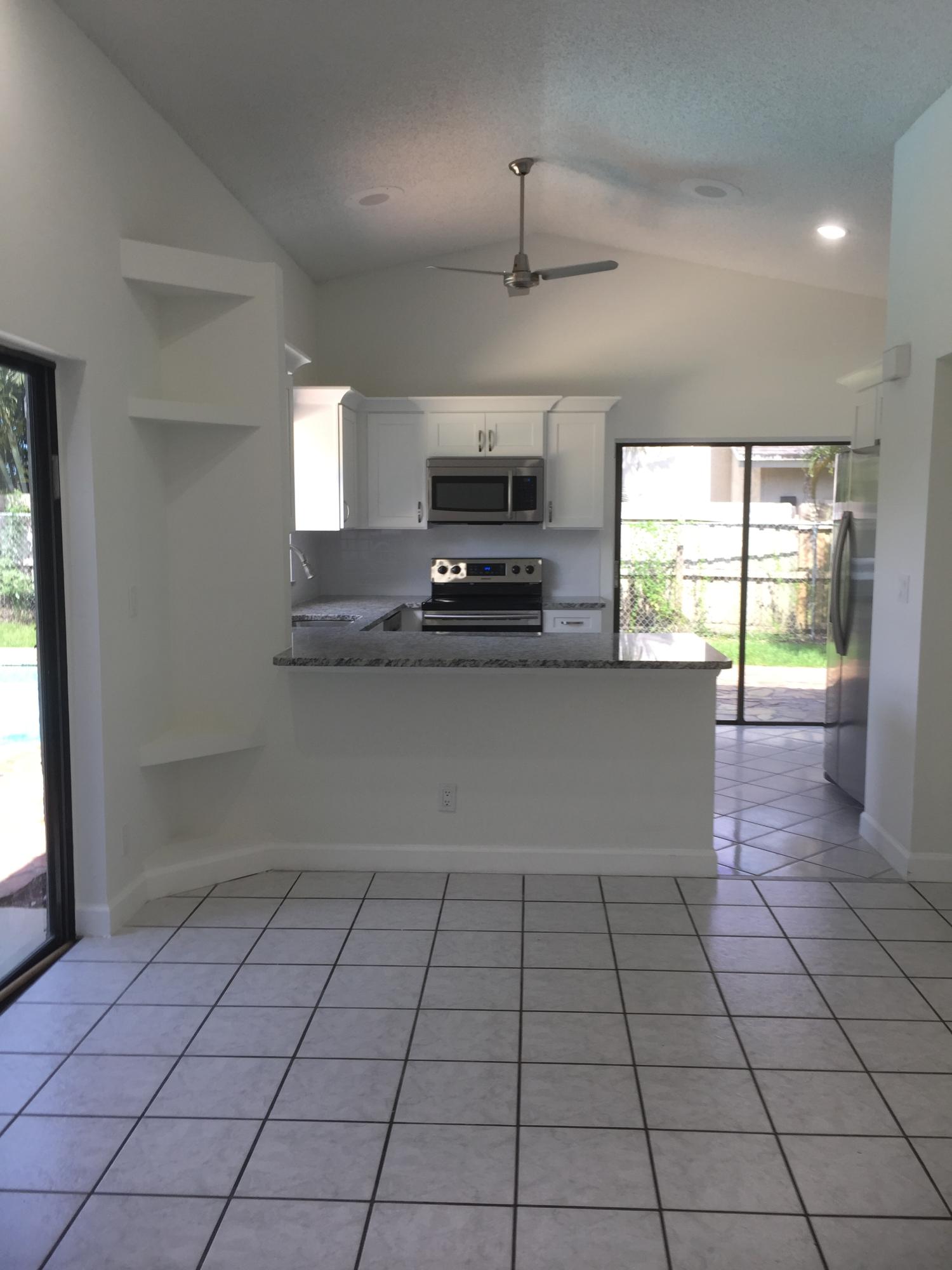 9235 Edgemont Lane Boca Raton, FL 33434 - Photo 4 of 22 Dining and Kitchen