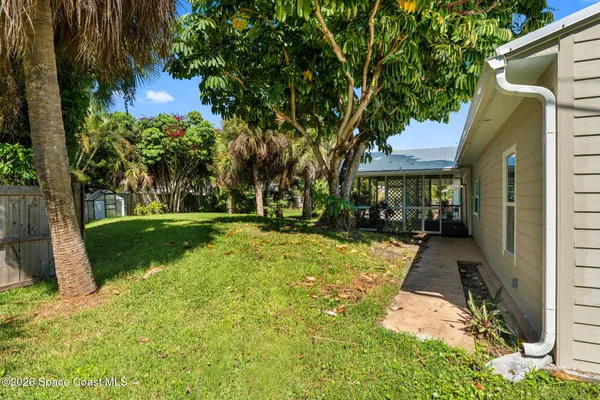 a view of a backyard with a garden