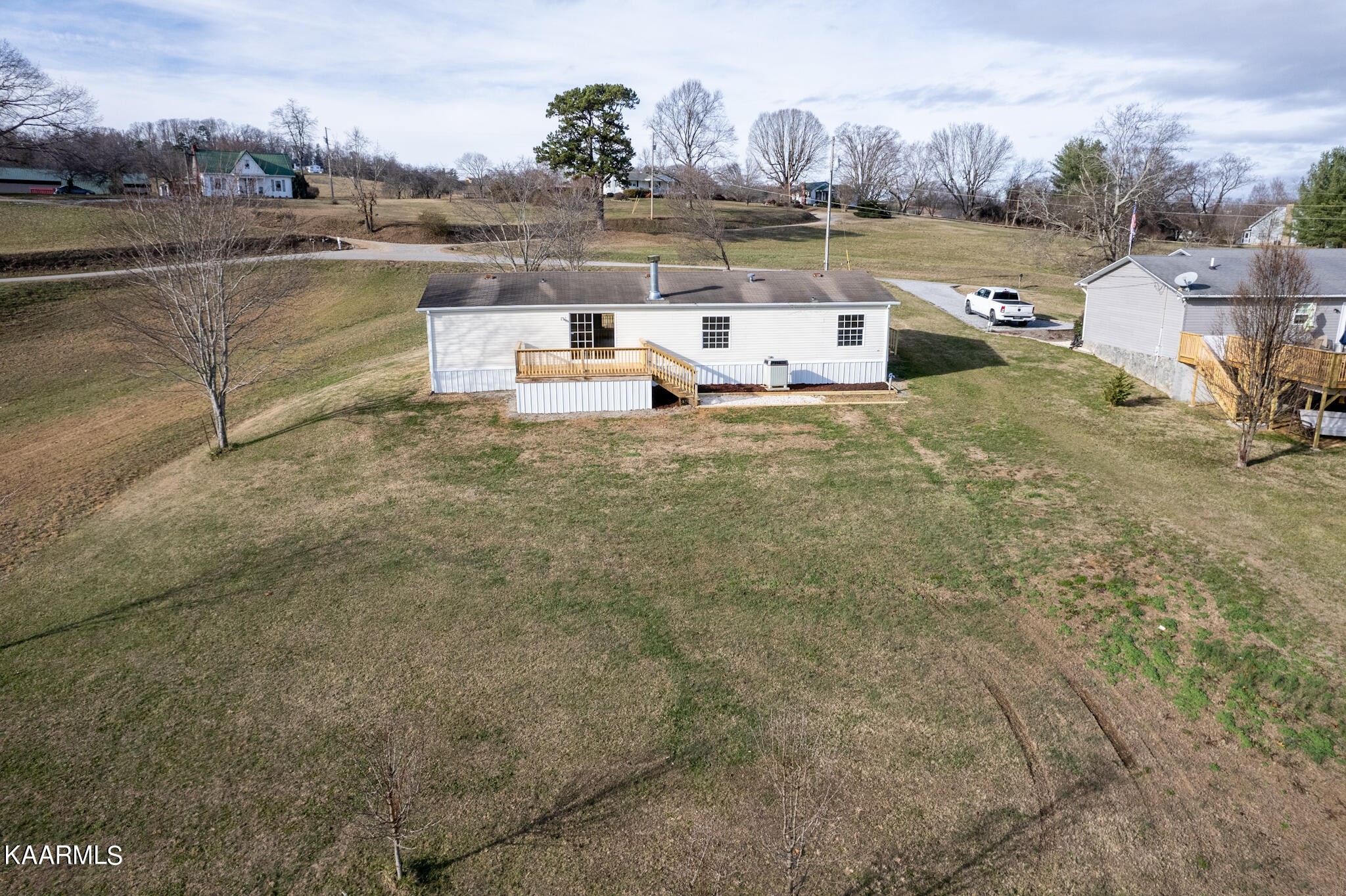 560 Meadowview Road Mosheim, TN 37818 - Photo 22 of 23 a aerial view of a house with outdoor space
