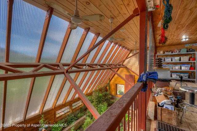 a view of a garage with furniture