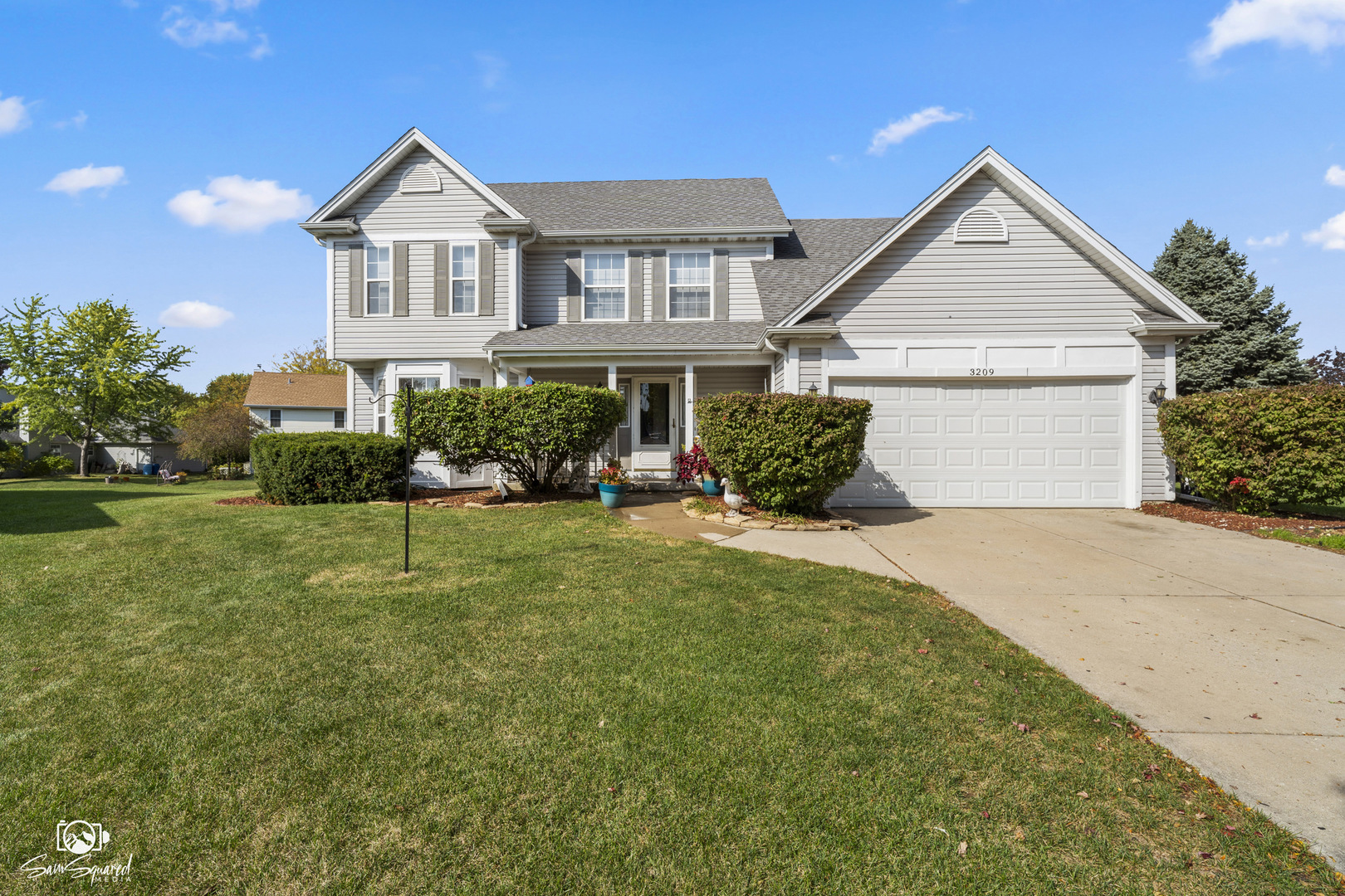 3209 Sunset Court Crest Hill, IL 60403 - Photo 1 of 38 a front view of a house with a yard and garage