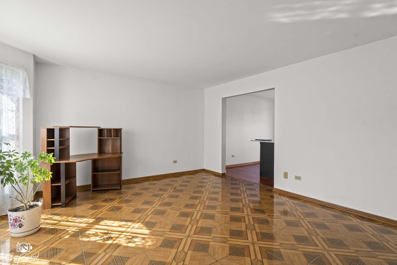 3209 Sunset Court Crest Hill, IL 60403 - Photo 16 of 38 a view of a livingroom with wooden floor and a potted plant