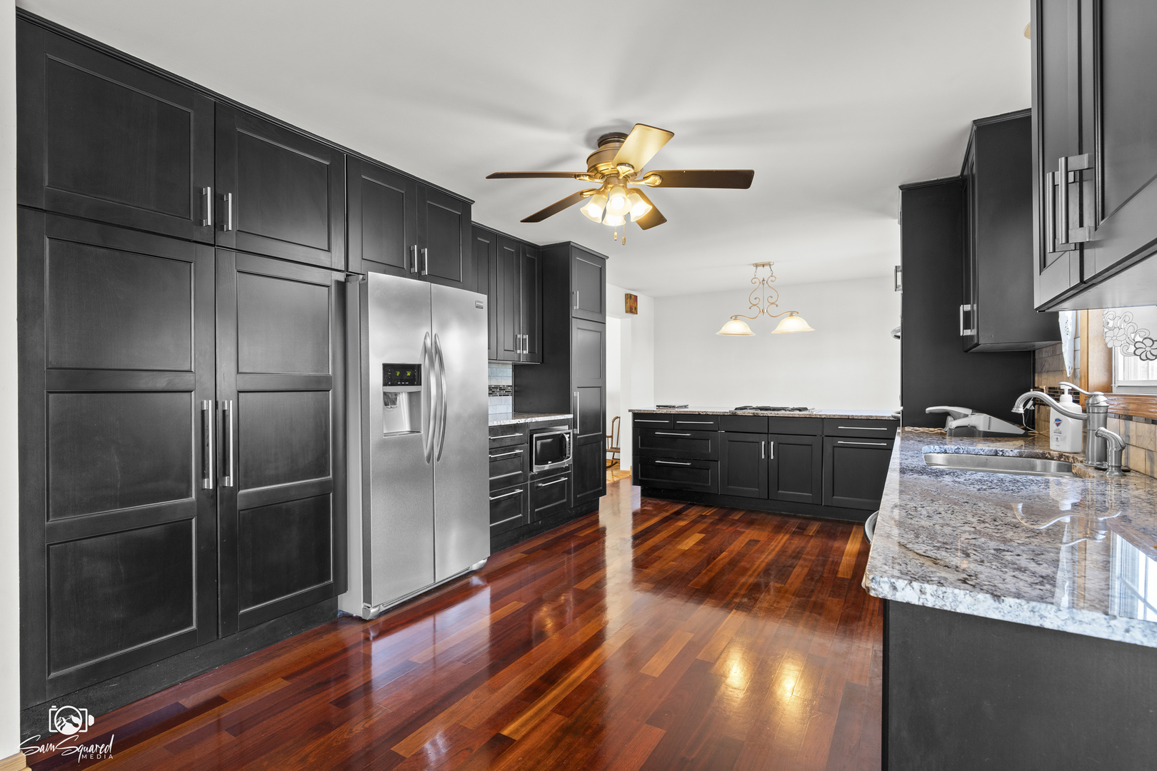 3209 Sunset Court Crest Hill, IL 60403 - Photo 22 of 38 a kitchen with a refrigerator and a sink