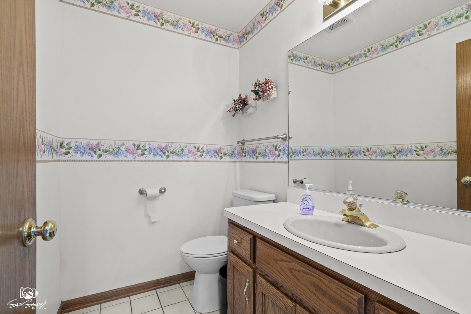 3209 Sunset Court Crest Hill, IL 60403 - Photo 26 of 38 a bathroom with a sink vanity mirror and toilet