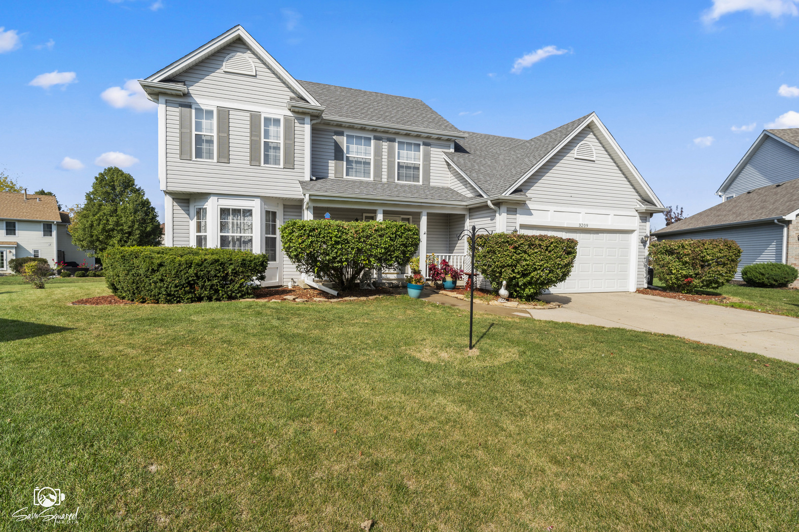 3209 Sunset Court Crest Hill, IL 60403 - Photo 3 of 38 a front view of a house with a yard and potted plants