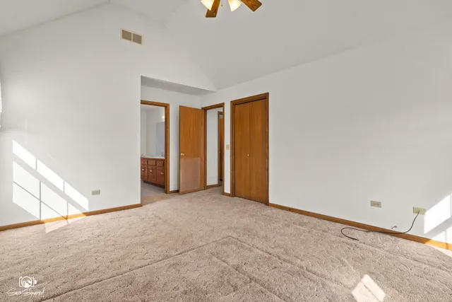 a spacious bathroom with a double vanity sink mirror and