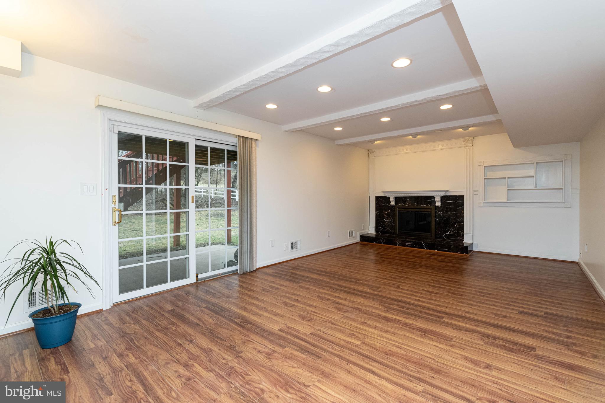 5200 Lynngate Road Columbia, MD 21044 - Photo 24 of 43 Rec room with slider to patio and back yard