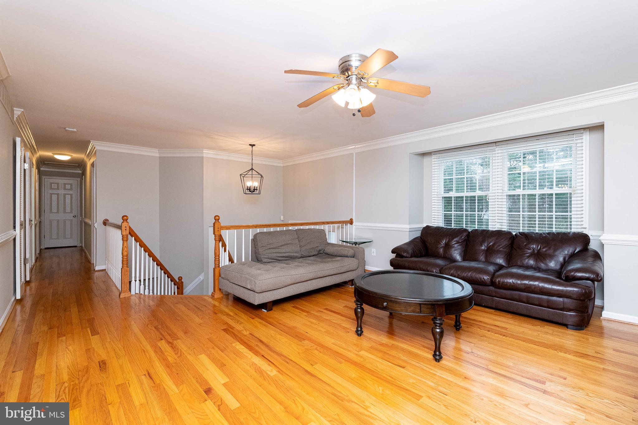 5200 Lynngate Road Columbia, MD 21044 - Photo 5 of 43 Crown moulding and chair rail add style!