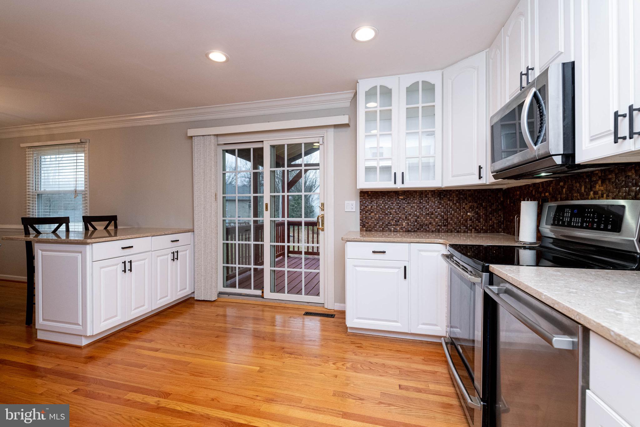5200 Lynngate Road Columbia, MD 21044 - Photo 10 of 43 French doors to screened in deck