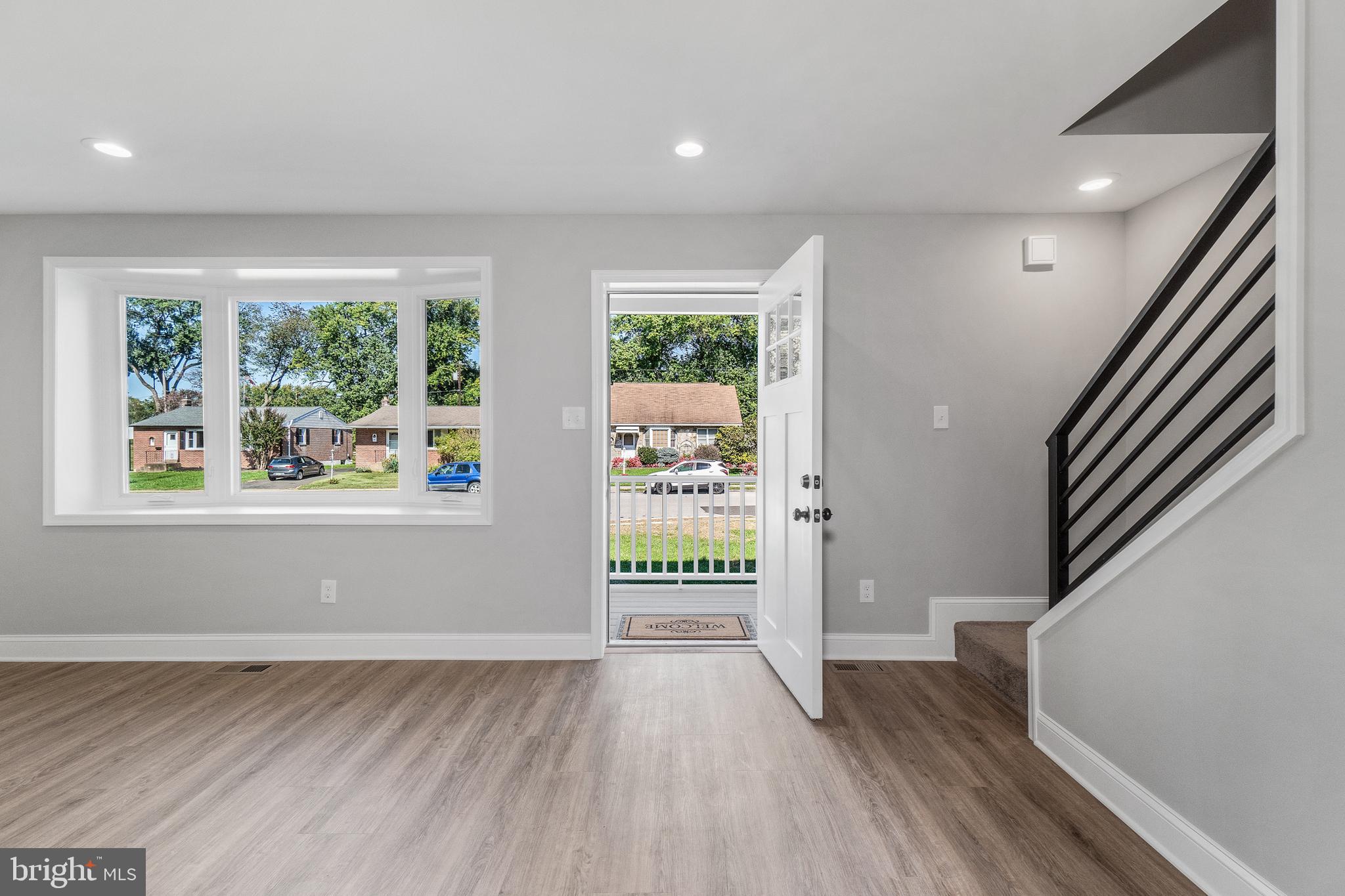 40 Brookside Road Glenside, PA 19038 - Photo 12 of 35 wooden floor in an empty room with a window