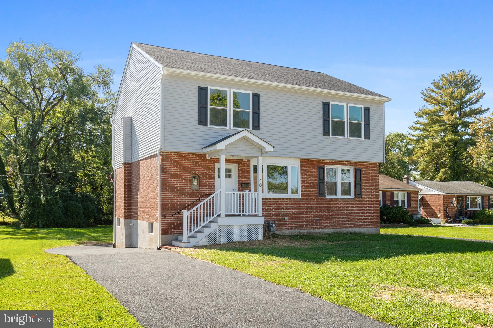40 Brookside Road Glenside, PA 19038 - Photo 34 of 35 a front view of a house with garden