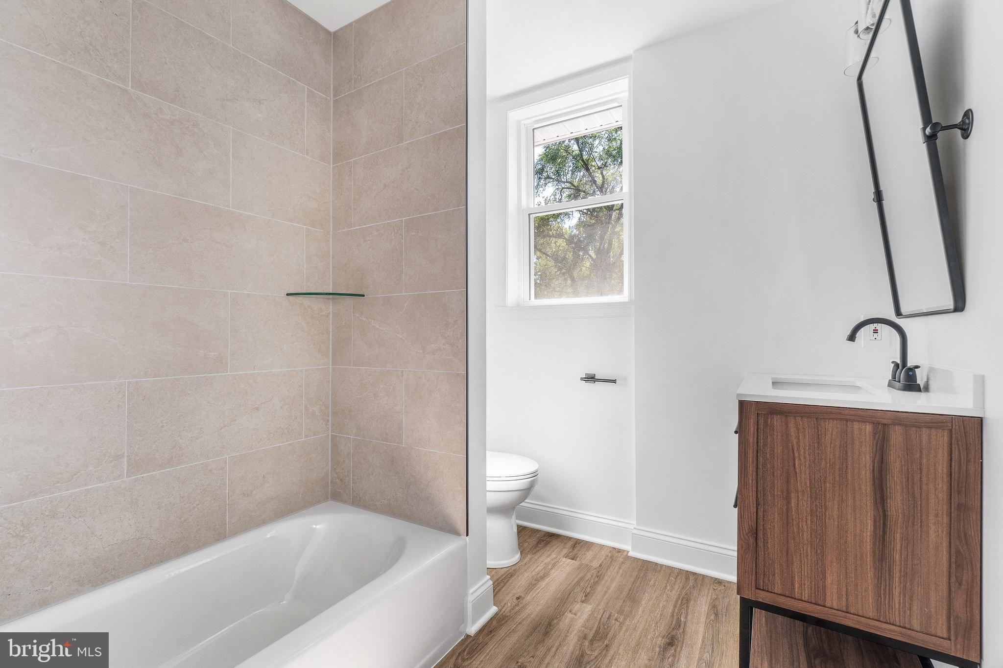 40 Brookside Road Glenside, PA 19038 - Photo 9 of 35 a bathroom with a bathtub and a sink